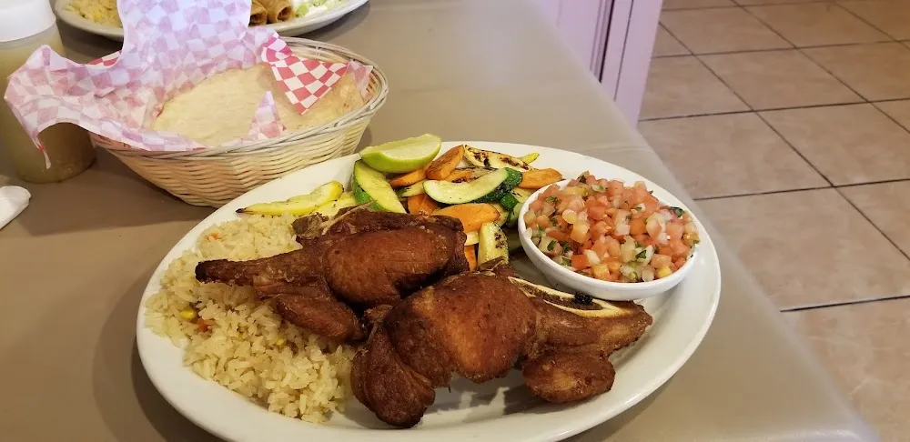 Chuleta Regular with Arroz Vegetales Ela Plancha & Pico De Gallo with a Side Order of Bread